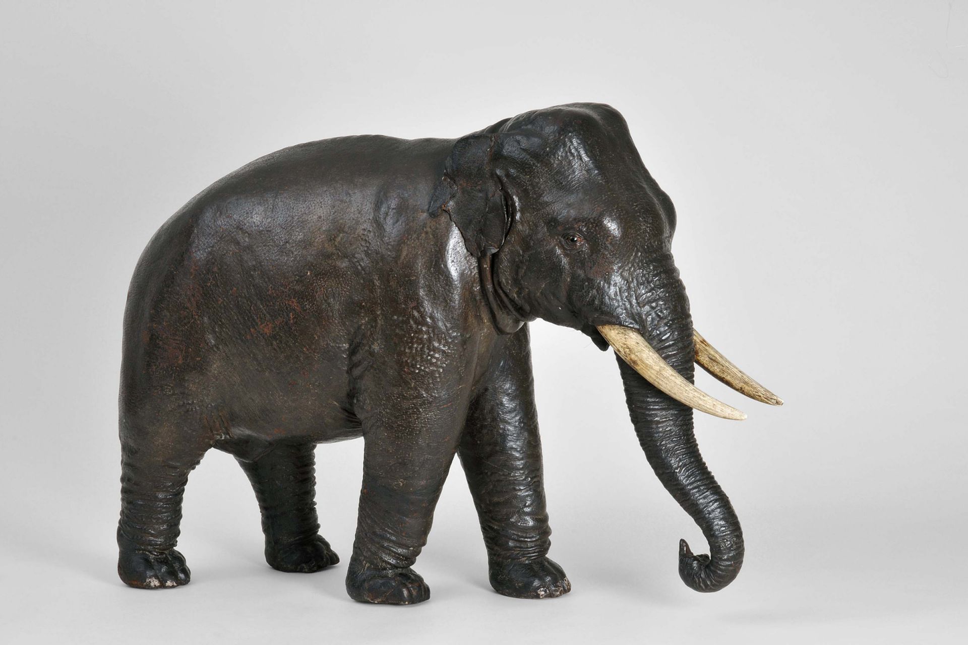 Animal sculpture of an elephant, probably European, 19th century; pigskin, wood, ivory; acquired in 1925 Animal sculpture of an elephant, probably European, 19th century; pigskin, wood, ivory; acquired in 1925